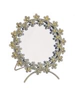 Petit miroir motif fleurs en métal doré effet vieilli
